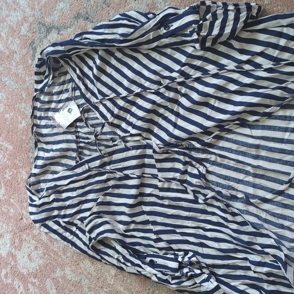 Brand new Charlotte Russe stripped blouse high low